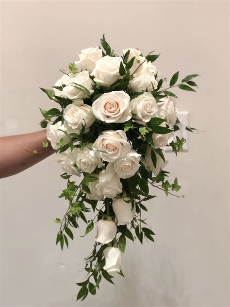 Cut each stem approx 6 inches long and work around the <b>bouquet</b> holder to cover it completely. . How to make a fresh flower cascading bouquet